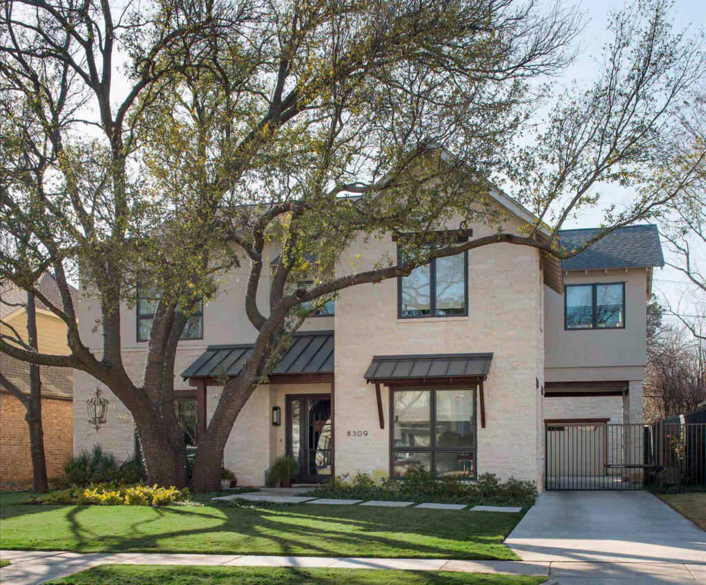 Modern luxury custom home exterior with mature trees in Dallas, TX