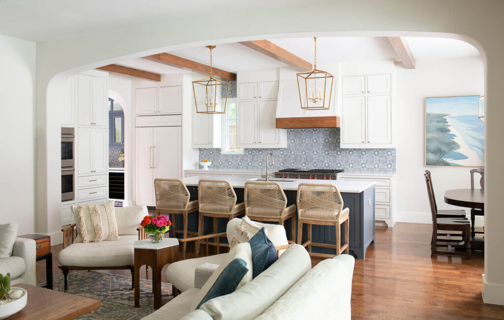 Open concept luxury kitchen with island and bar stools in Dallas, TX