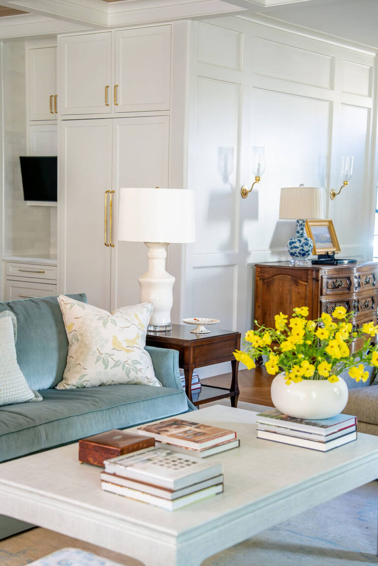Custom sitting room with layered textures and blue sofa