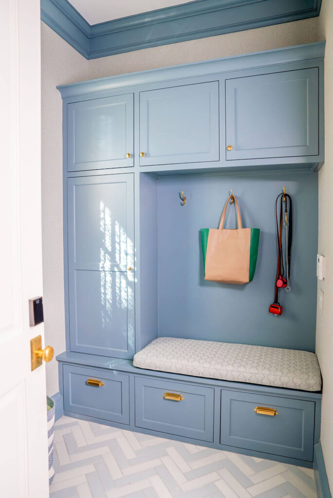 Built-in mudroom bench with blue cabinetry in Bryn Mawr project